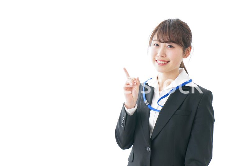 ポイントを指差す若い女性