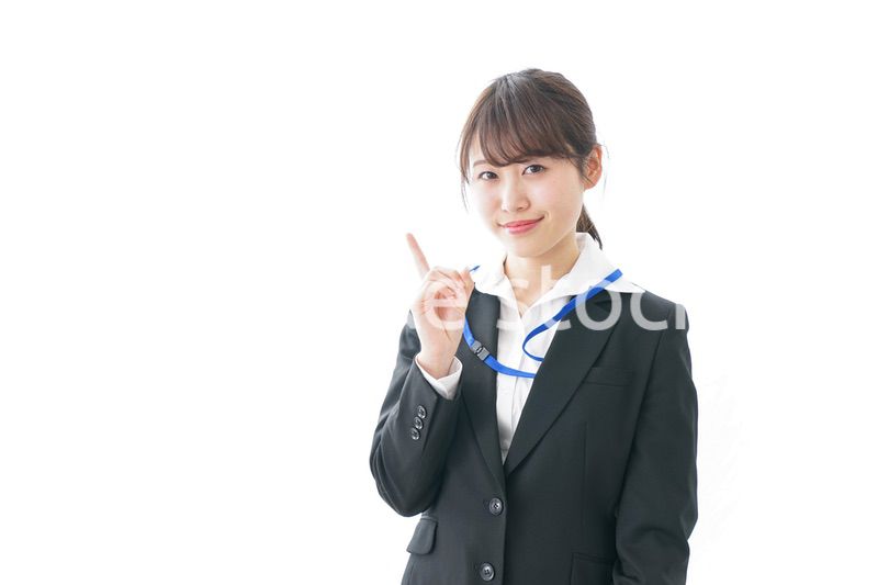 ポイントを指差す若い女性