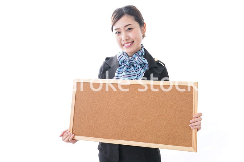 ボードを持つキャビンアテンダント