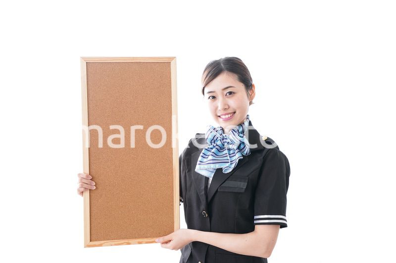 ボードを持つキャビンアテンダント