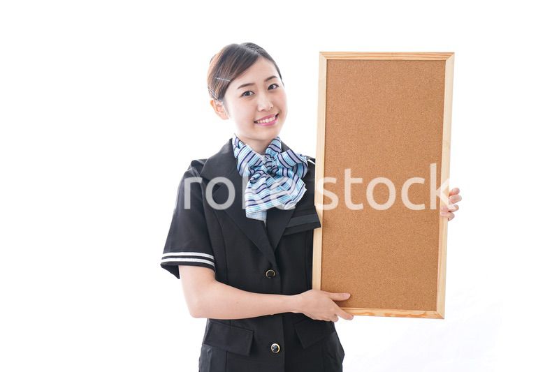 ボードを持つキャビンアテンダント