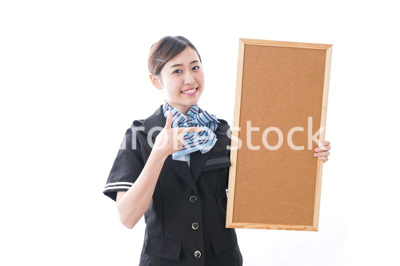 ボードを持つキャビンアテンダント