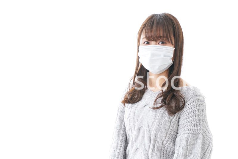 風邪をひいた女性