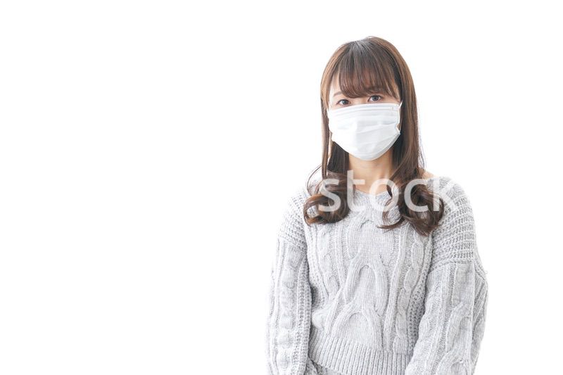 風邪をひいた女性