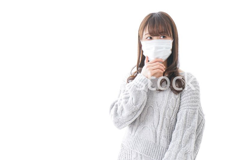 風邪をひいた女性