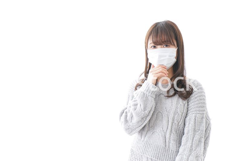 風邪をひいた女性
