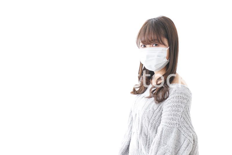 風邪をひいた女性