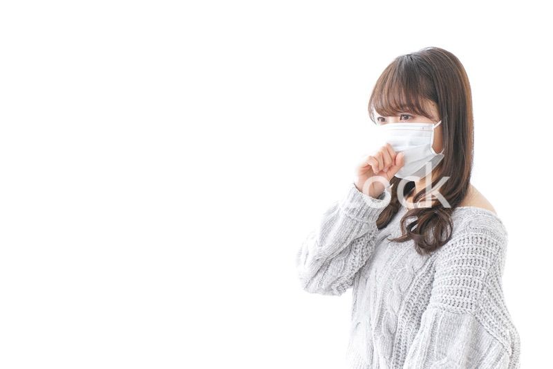 風邪をひいた女性