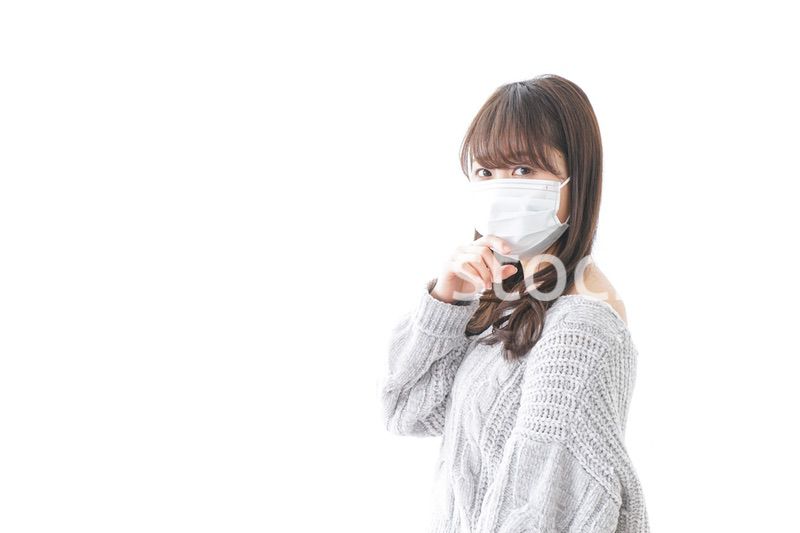風邪をひいた女性