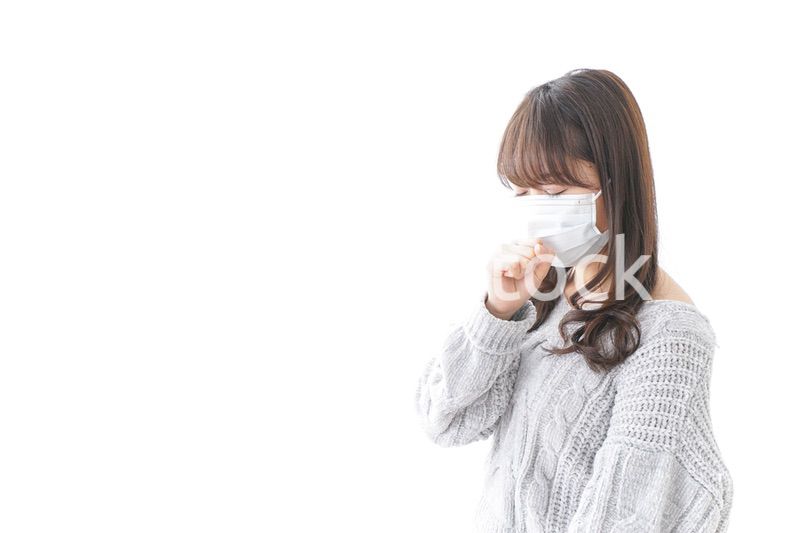 風邪をひいた女性