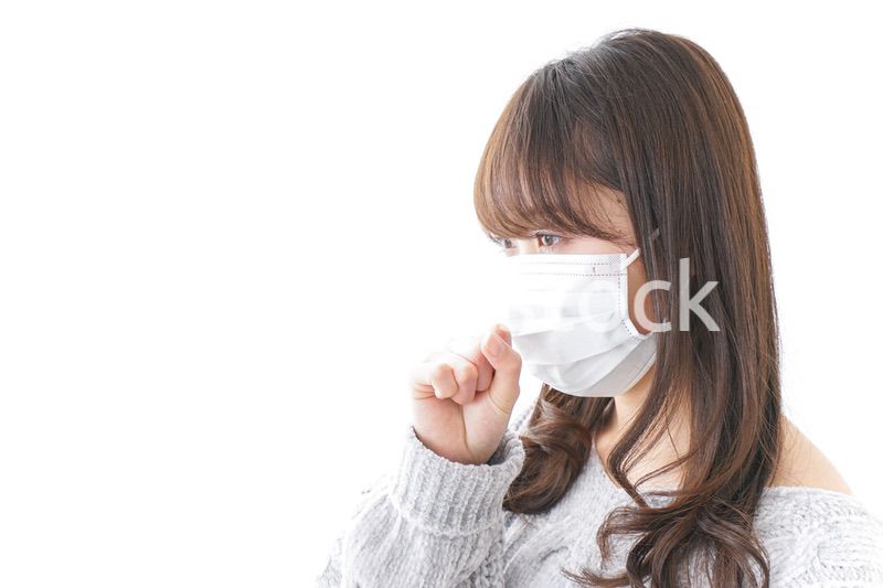 風邪をひいた女性