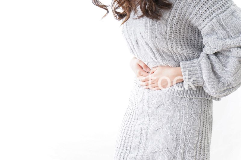 腹痛・生理痛に苦しむ女性