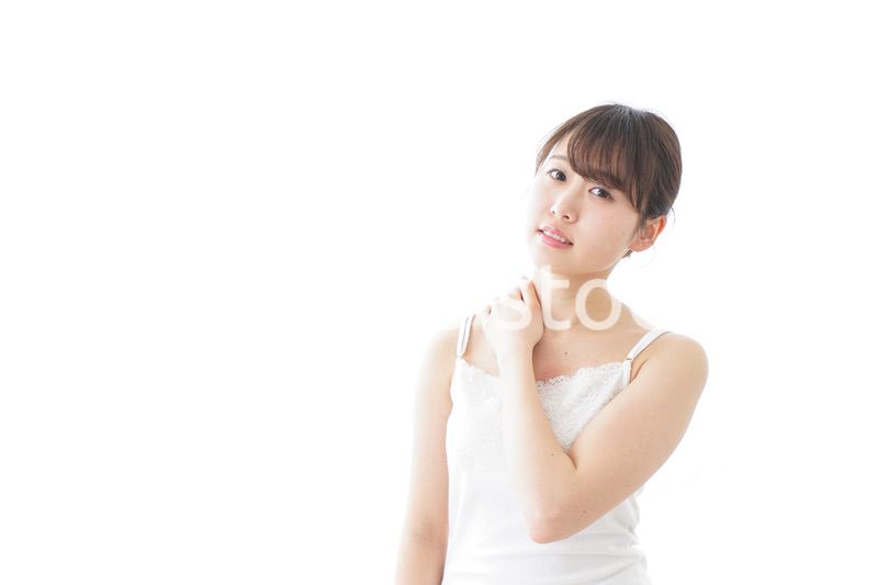 肩こり・関節痛に悩む女性