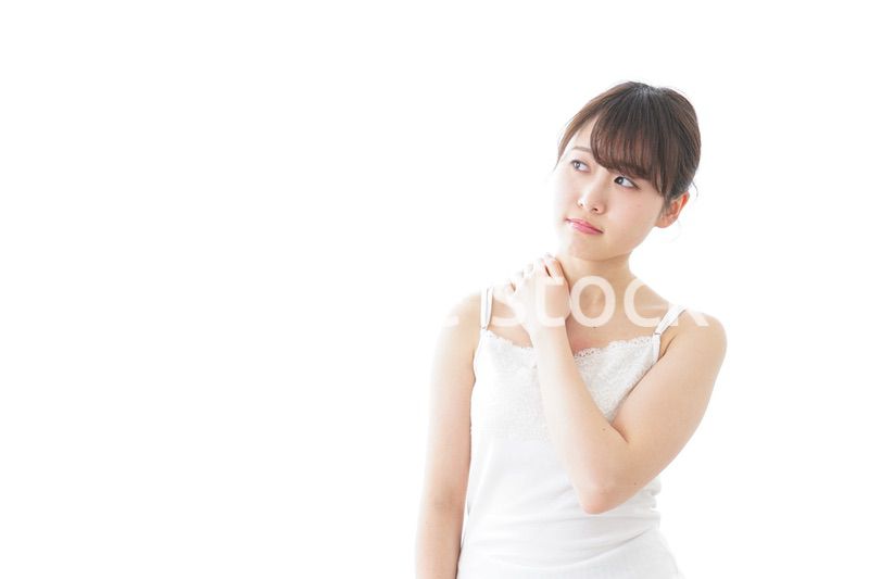 肩こり・関節痛に悩む女性