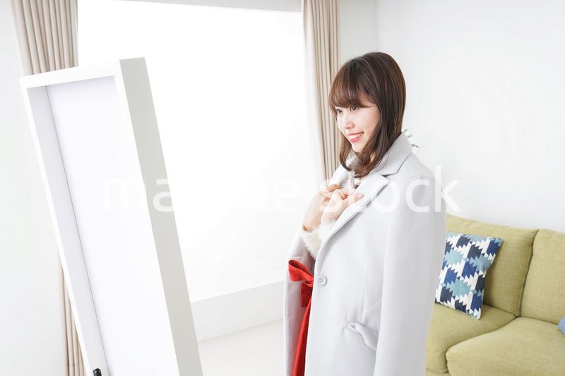 お洒落をする女性