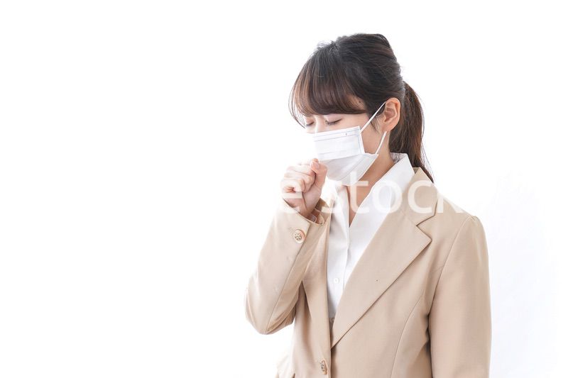 風邪をひいたビジネスウーマン