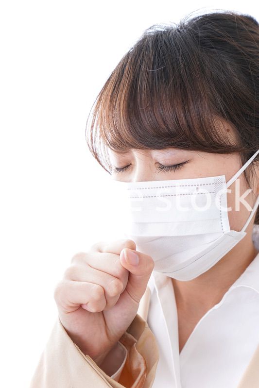 風邪をひいたビジネスウーマン