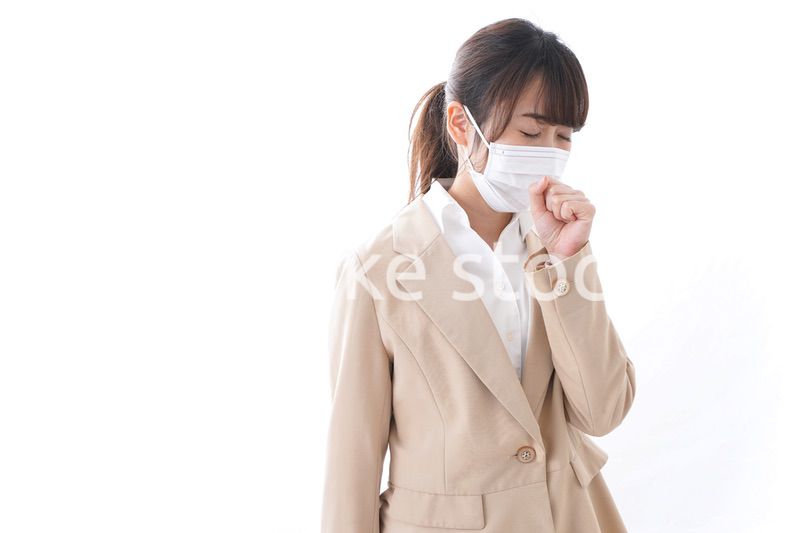 風邪をひいたビジネスウーマン