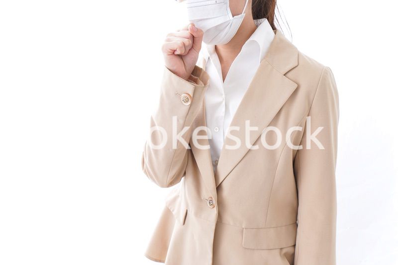 風邪をひいたビジネスウーマン