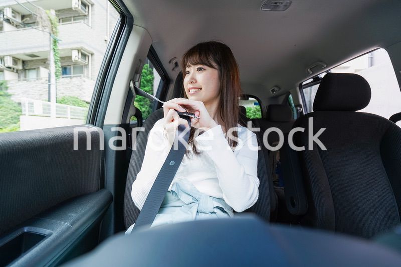 Woman go into a car