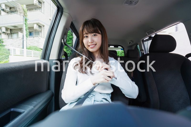 Woman go into a car