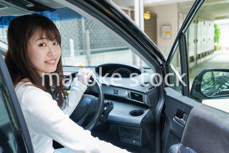Woman go into a car