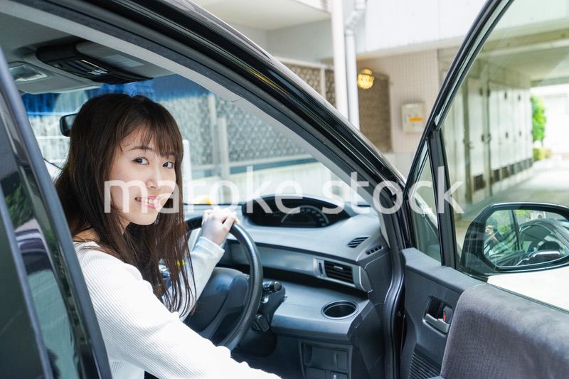 Woman go into a car
