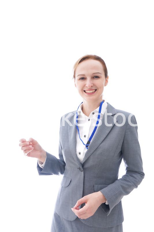 大笑いをするスーツを着たビジネスウーマン