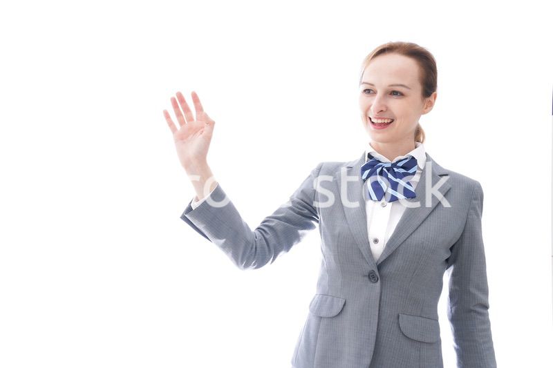 手をふる制服を着た留学生