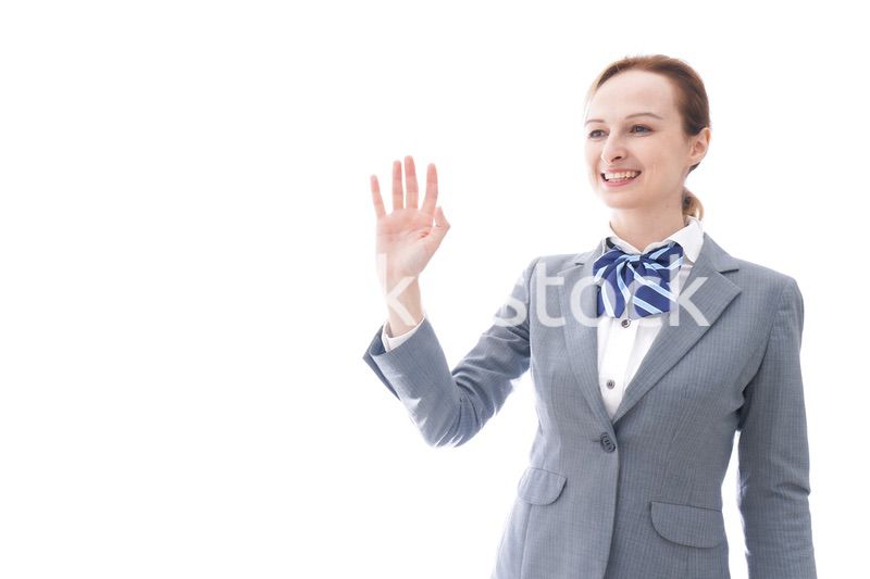 手をふる制服を着た留学生