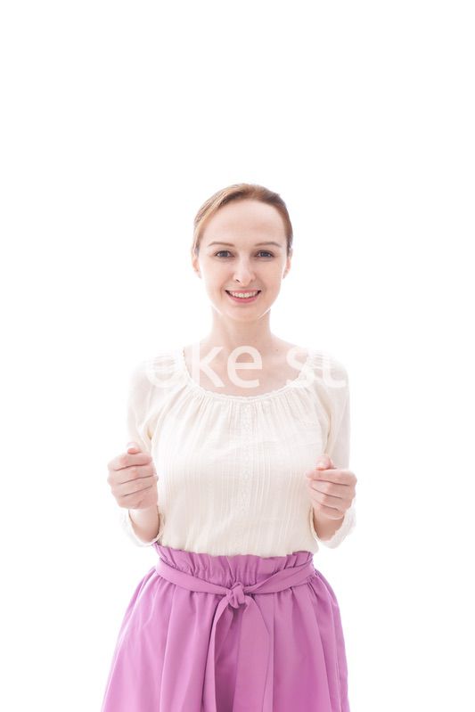 大喜びをする笑顔の若い女性