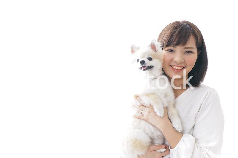 犬を抱く女性・ブリーダー
