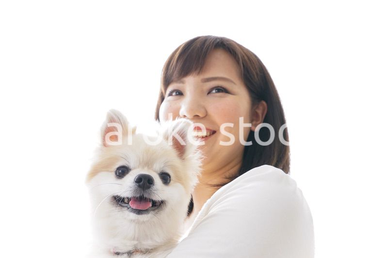 犬を抱く女性・ブリーダー