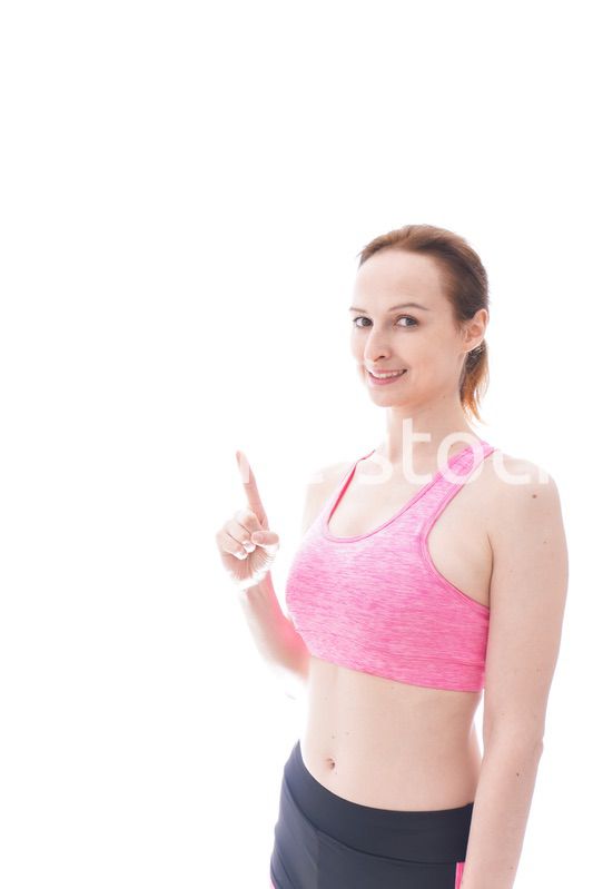 アドバイスをするスポーツウェアを着た若い女性