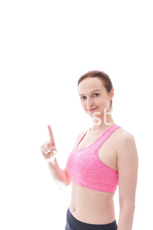 アドバイスをするスポーツウェアを着た若い女性