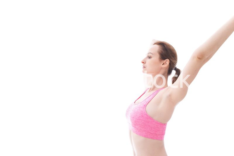 ストレッチをする笑顔の若い女性