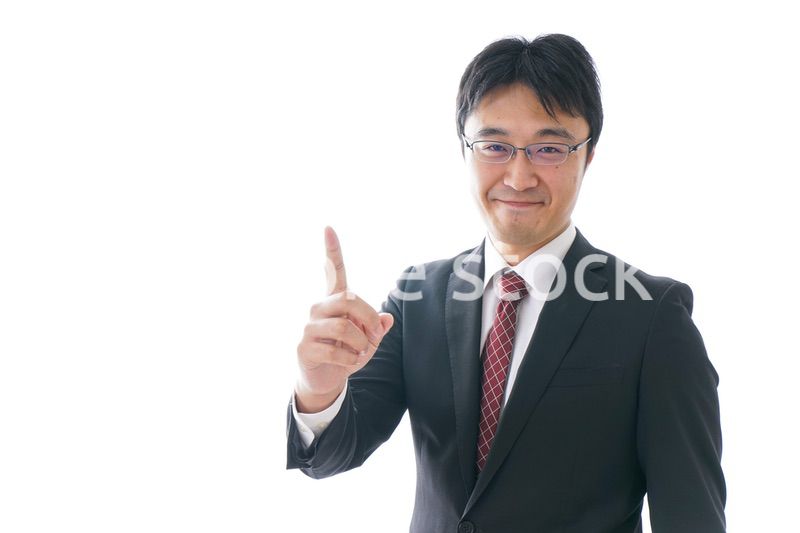 指をさすビジネスマン