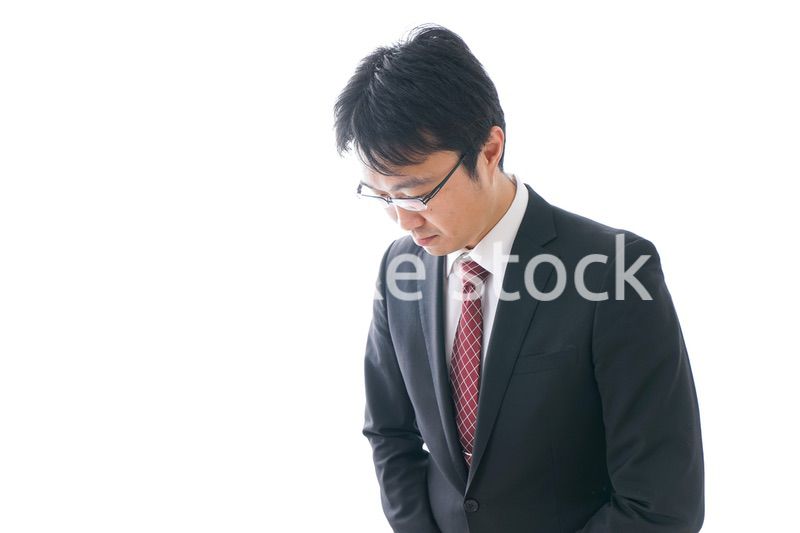 謝罪をするビジネスマン・謝罪会見