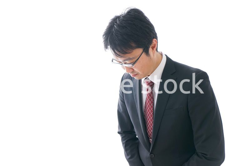 謝罪をするビジネスマン・謝罪会見