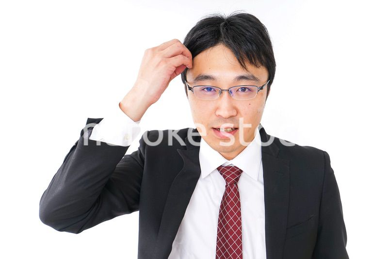身だしなみを整えるビジネスマン・抜け毛イメージ