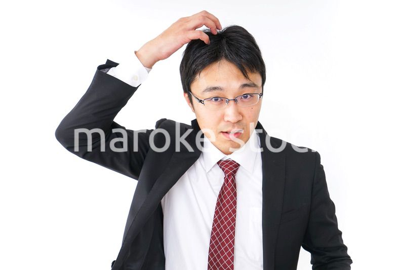 身だしなみを整えるビジネスマン・抜け毛イメージ