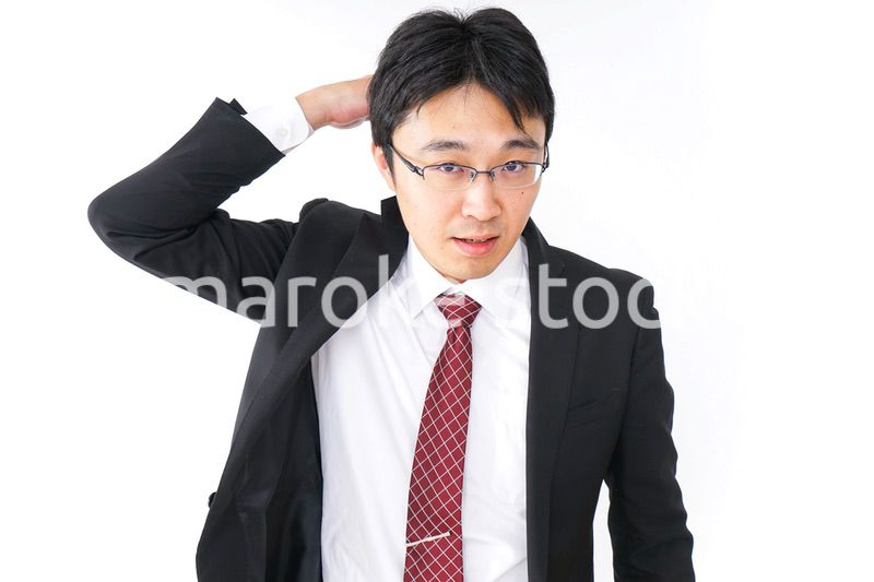 身だしなみを整えるビジネスマン・抜け毛イメージ