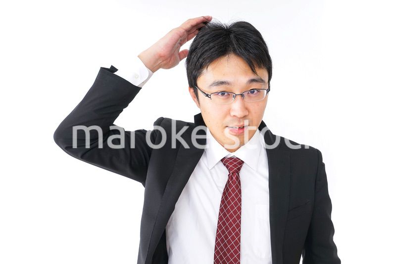 身だしなみを整えるビジネスマン・抜け毛イメージ