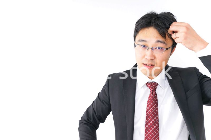 身だしなみを整えるビジネスマン・抜け毛イメージ