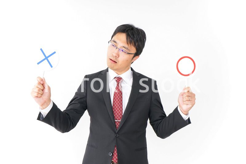 悩むビジネスマン