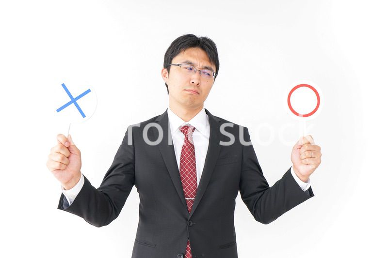 悩むビジネスマン