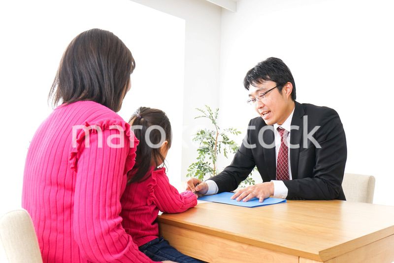 営業の男性と家族