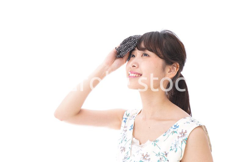 猛暑・汗をかく女性