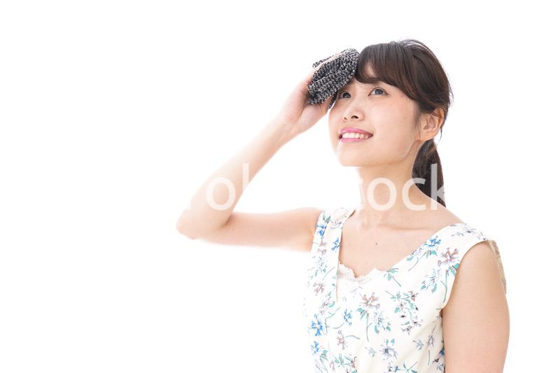 猛暑・汗をかく女性
