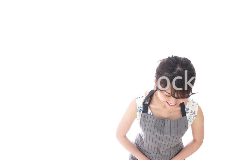 おじぎをするカフェの店員・おもてなし